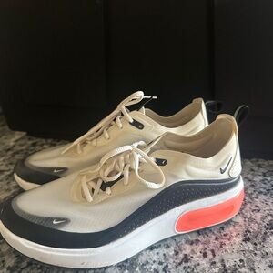 Nike Cream and Black Sneakers with Bright Orange Detail